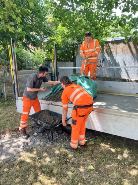 Men working on a community garden